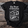 Black t-shirt with "The Beast of Gévaudan French Countryside Tour" text and wolf illustration.