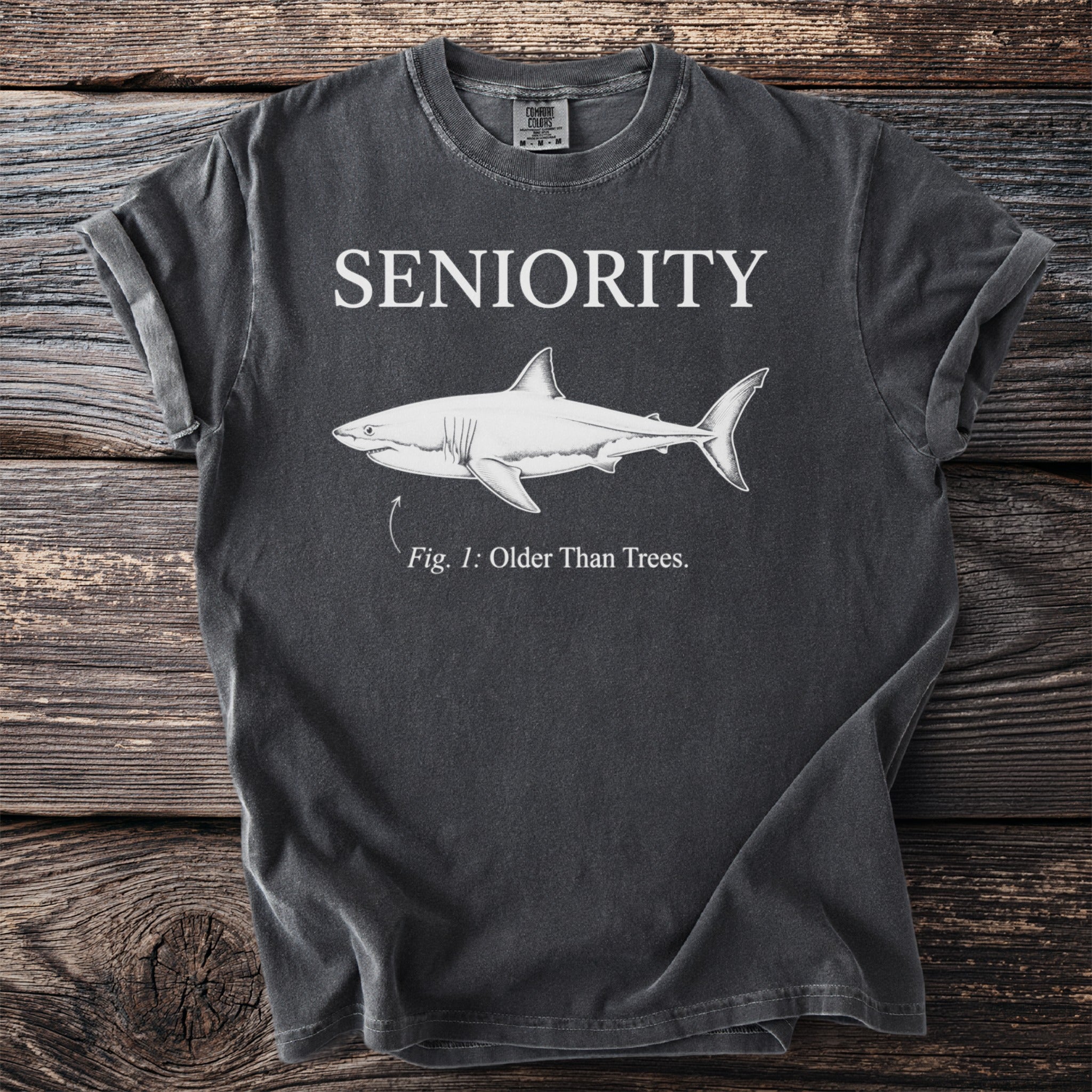 T-shirt with the words "SENIORITY" and a shark labeled "Fig. 1: Older Than Trees."