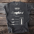 Dark gray t-shirt graphic with sawfish anatomy and information.