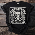 Black t-shirt with skull, crossbones, plants, and text.