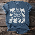 Blue t-shirt with a Wildlife illustration and "respect the locals" text.