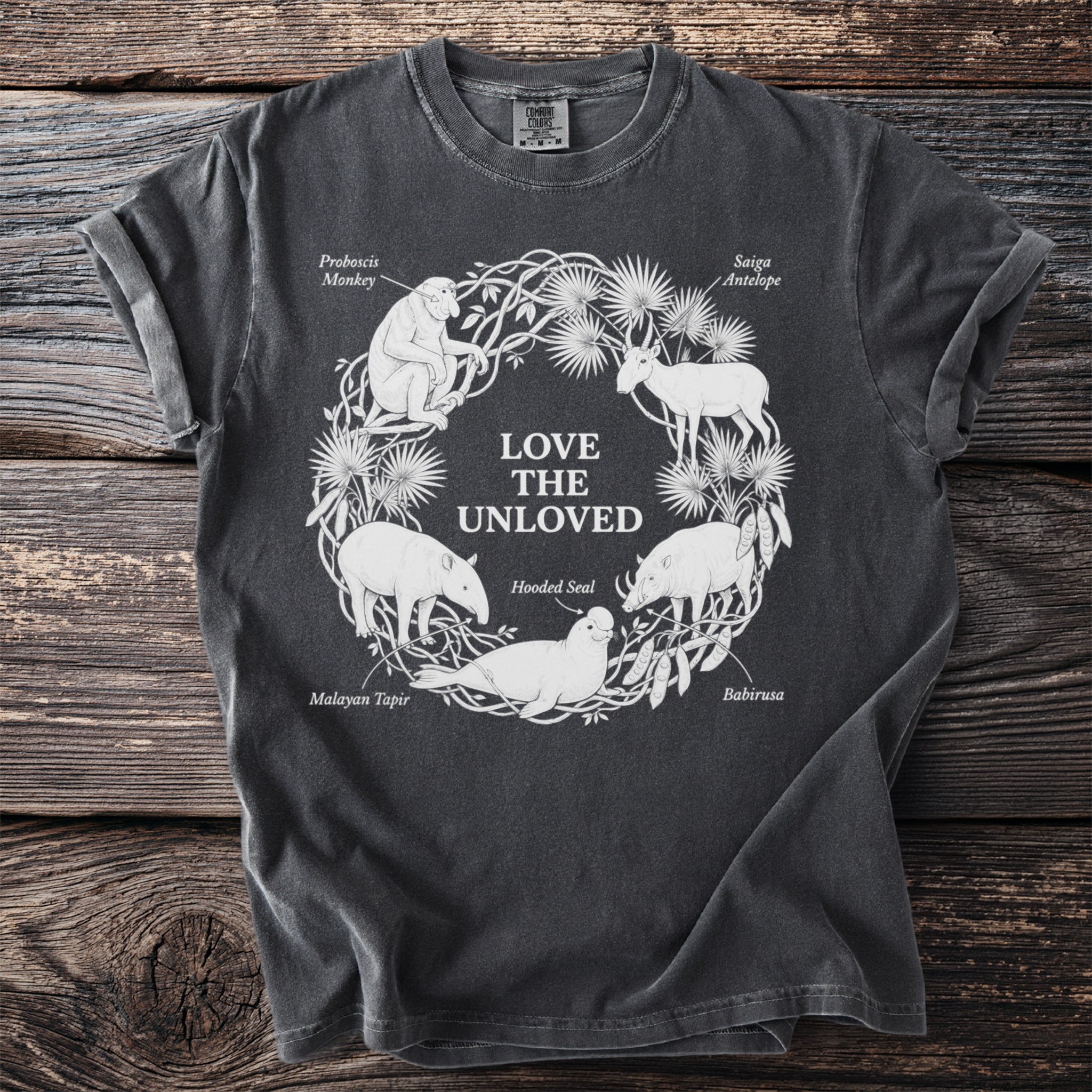 T shirt with Love the Unloved and five unusual mammals in a botanical circle.