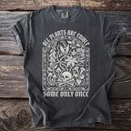 Dark t-shirt with "ALL PLANTS ARE EDIBLE SOME ONLY ONCE" and botanical skull design.