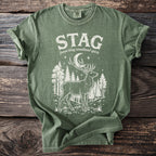 Green t-shirt with white graphic of a stag, moon, and trees.