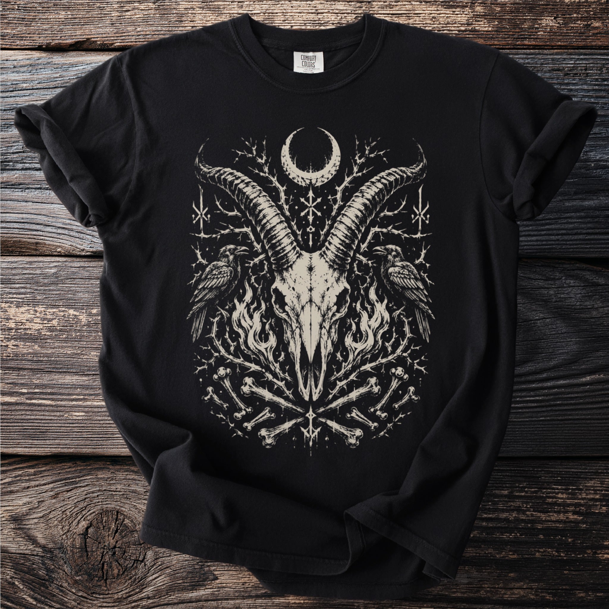 Black t-shirt with a graphic of a goat skull, crows, and bones.