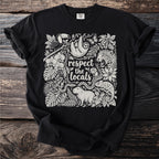Black t-shirt with "respect the locals" text and jungle animals illustration.