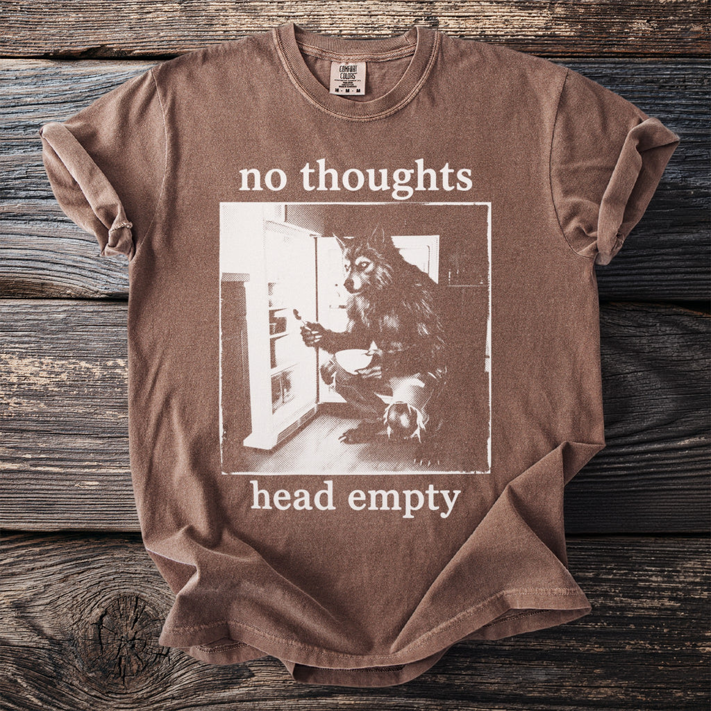 Brown t-shirt with "no thoughts head empty" text and wolf at refrigerator graphic.