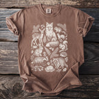 Brown t-shirt with a white line drawing of woodland animals and foliage.