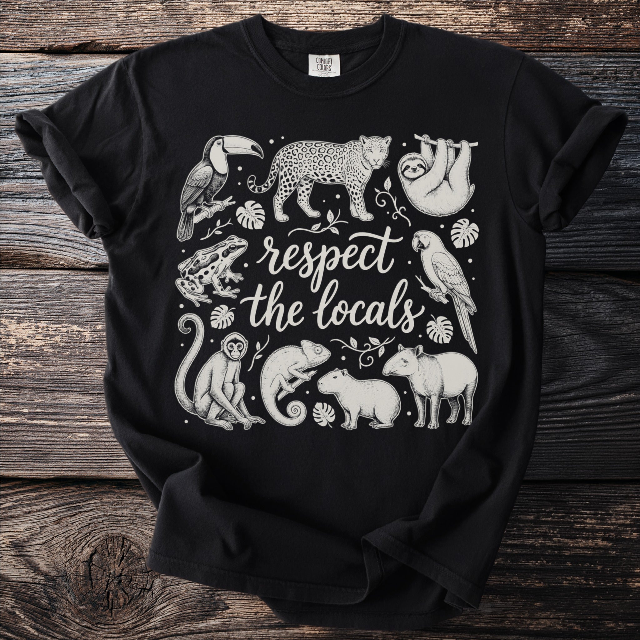 Black t-shirt with animal illustrations and text "respect the locals".
