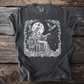 Dark gray t-shirt showing Frigg spinning stars beneath the moon with two owls.