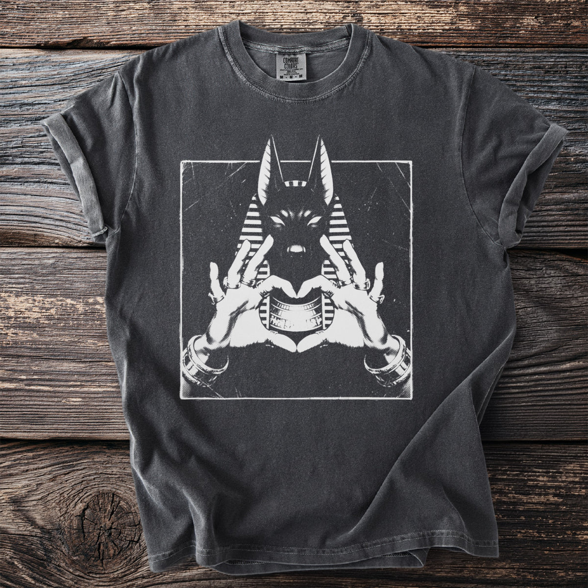 Black t-shirt with white graphic of Anubis head and hands forming a heart.
