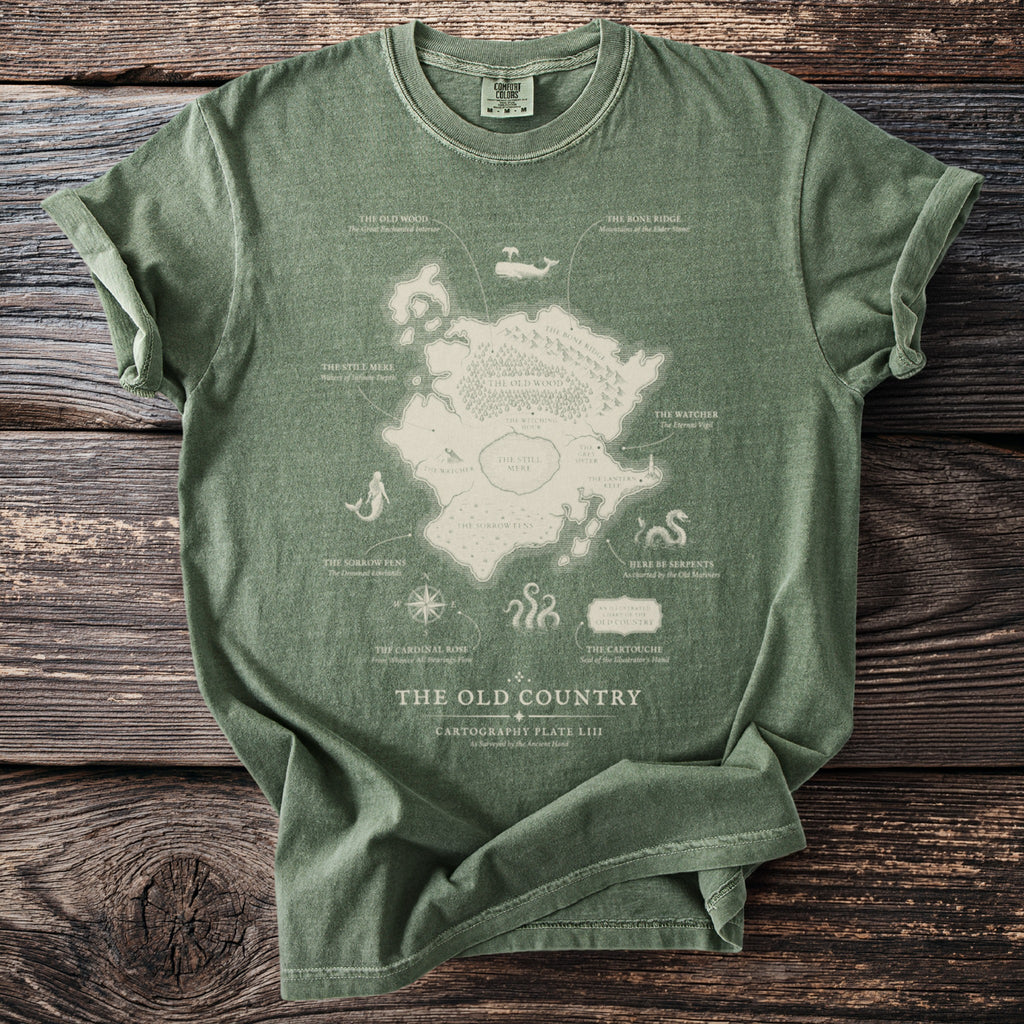 Green t-shirt with a map design titled "The Old Country" with various fictional locations.