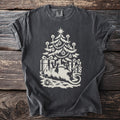 Pepper gray t-shirt with a cream folk-cut print: an opossum lies on its back under a candlelit Christmas tree, playing dead among the presents.