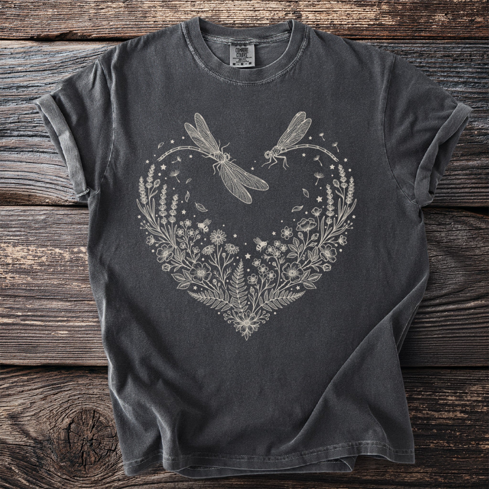 Dark grey t-shirt with a heart-shaped floral design and dragonflies.