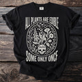 Black t-shirt with "All Plants Are Edible Some Only Once" text and floral skull graphic.