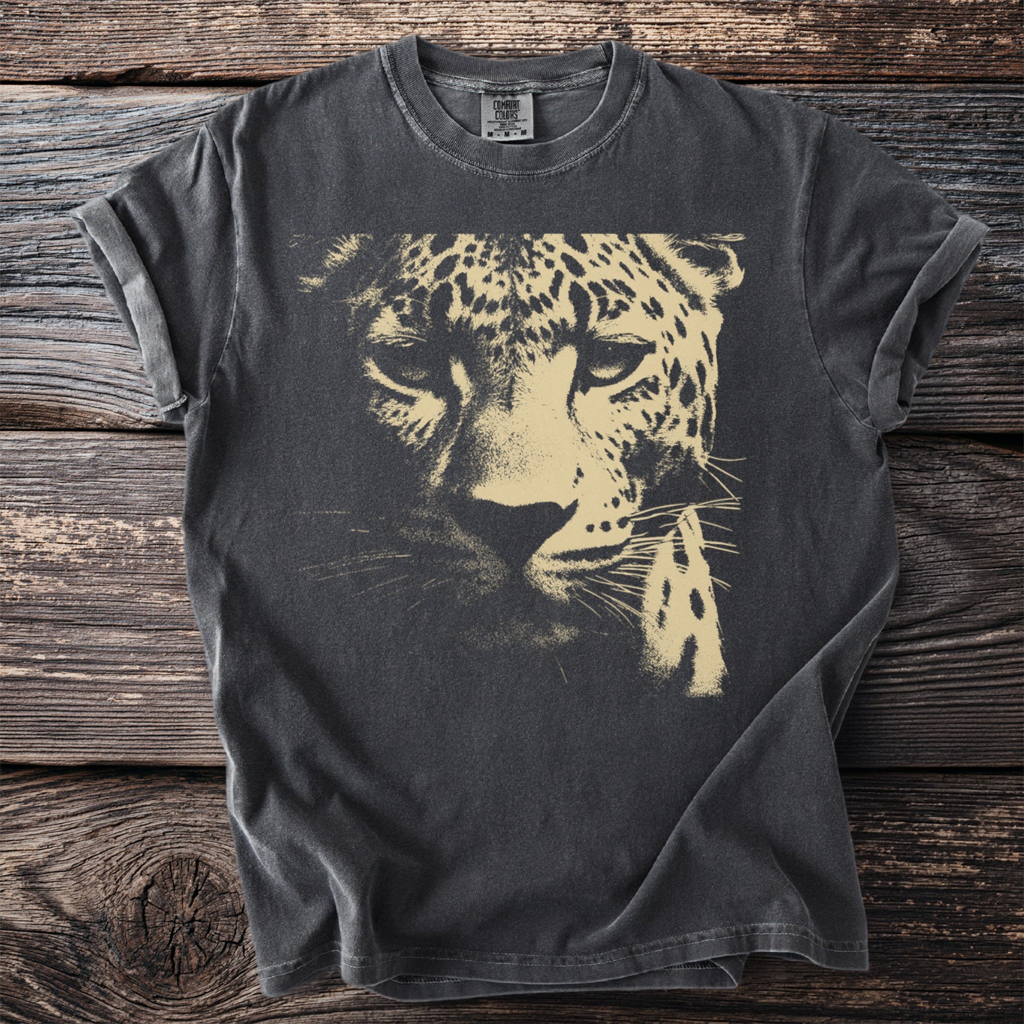 Dark grey t-shirt with a close-up distressed graphic of a leopard's face.