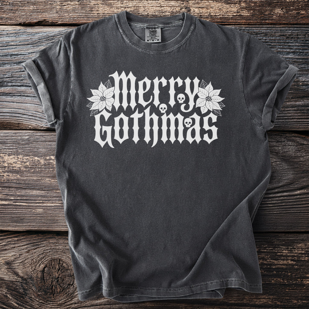 Dark gray t-shirt with white "Merry Gothmas" text and skull designs.