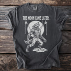 Dark t-shirt with graphic of howling werewolf and text "THE MOON CAME LATER".