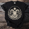 Black t-shirt with a cream zodiac sign of Aries graphic and a sun.