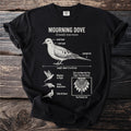 Black t-shirt featuring a detailed diagram of a mourning dove with labeled features and facts.
