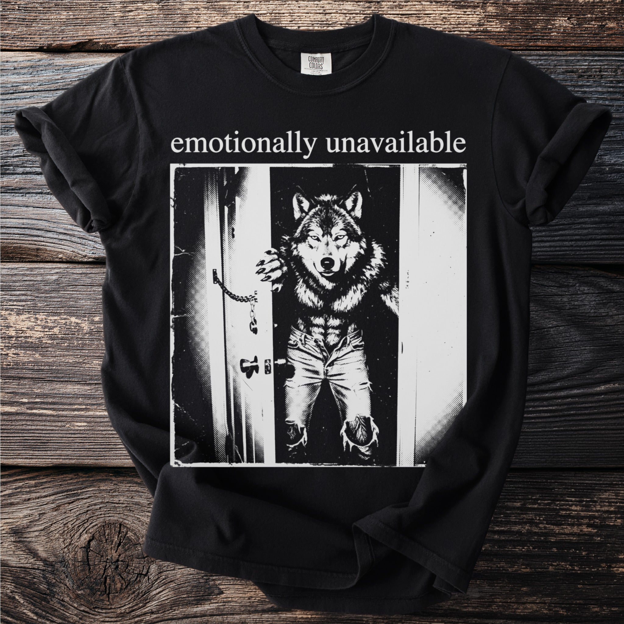 Black t-shirt with "emotionally unavailable" text and wolf-man graphic.