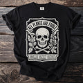 Black t-shirt with skull, bones, plants, "All Plants Are Edible" and "Some Only Once."