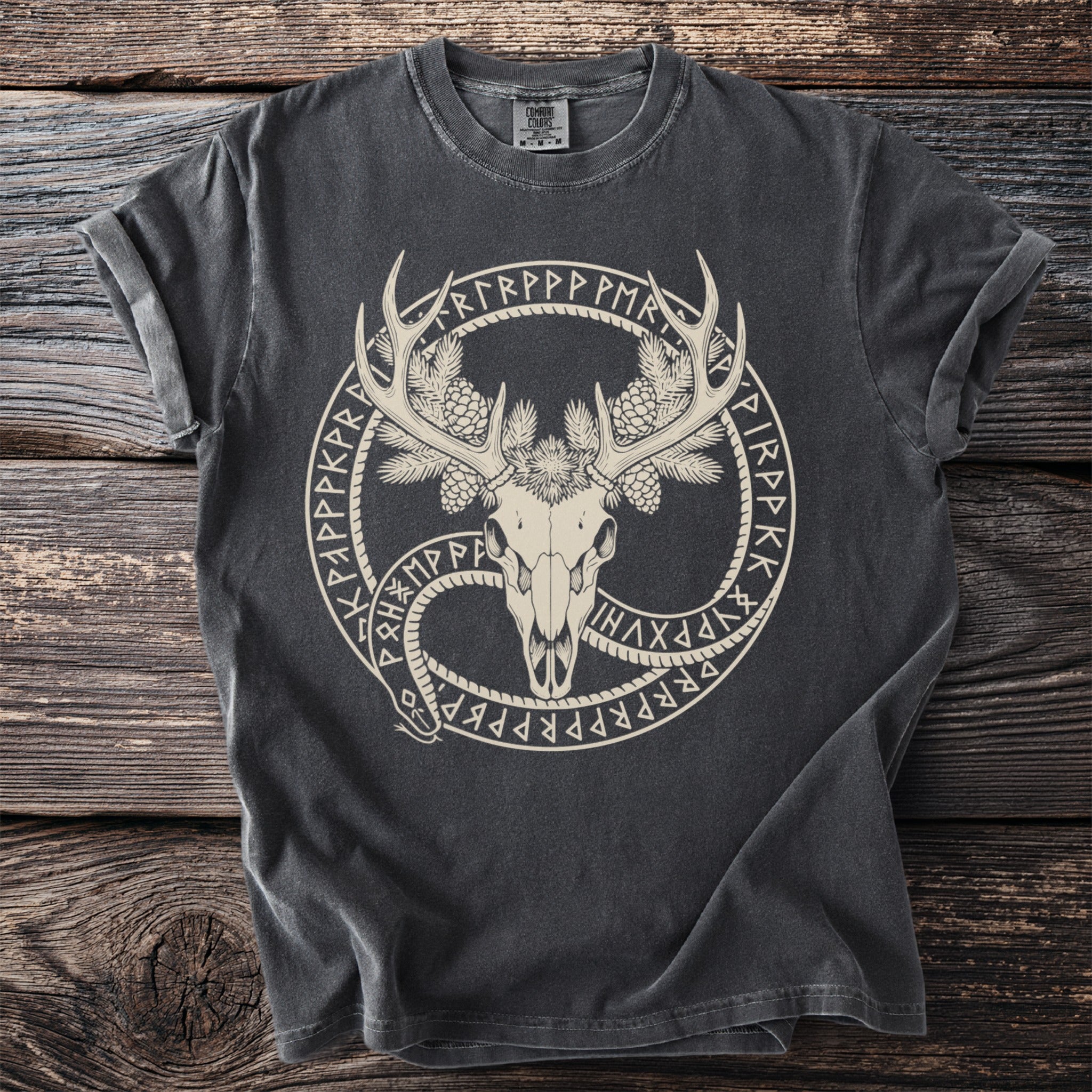 Dark grey t-shirt with a deer skull, antlers, pine cones, and runes.