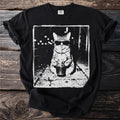 T-shirt with a black and white graphic of a cat wearing sunglasses and drinking a beverage.