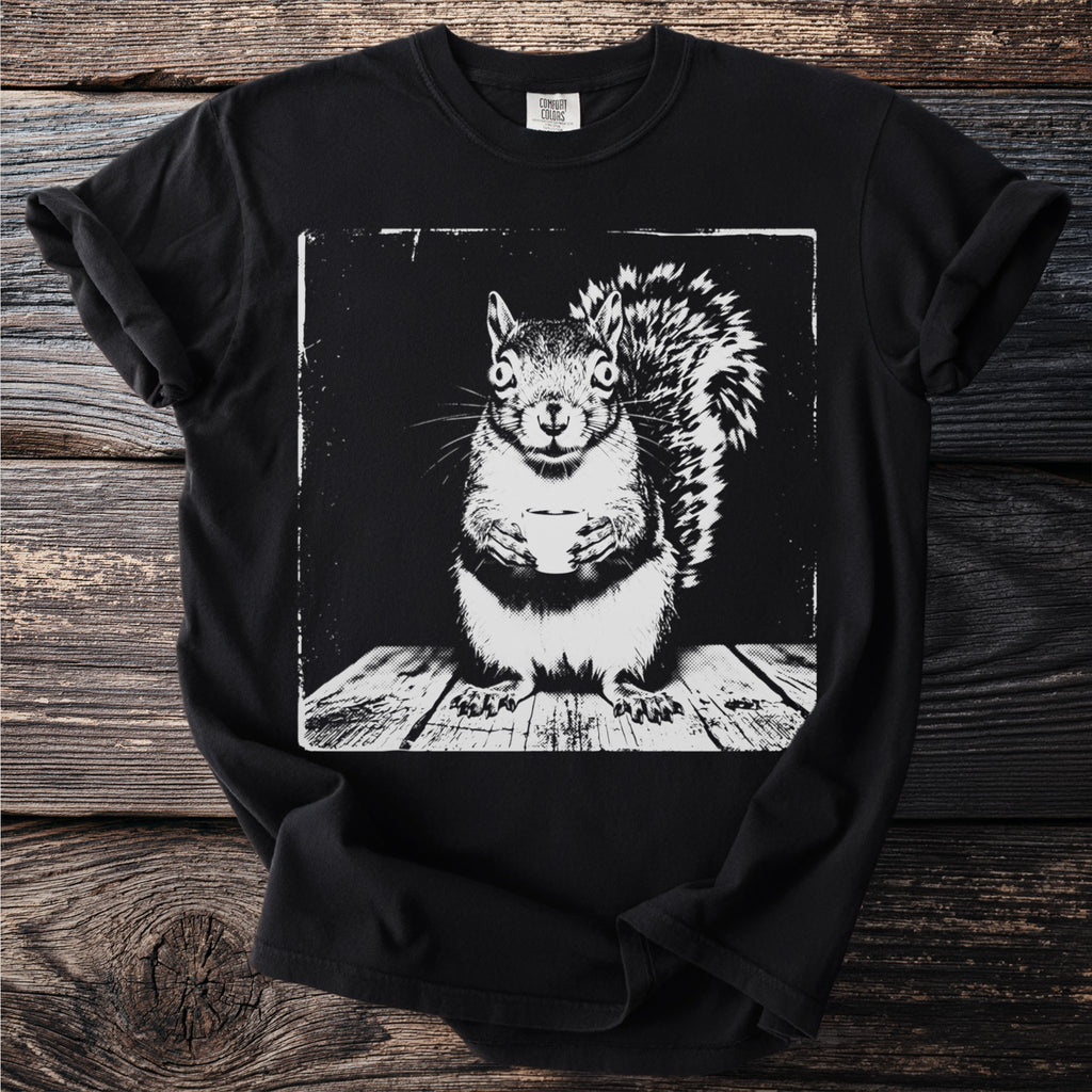 Black t-shirt with a black and white graphic of a squirrel holding a cup.