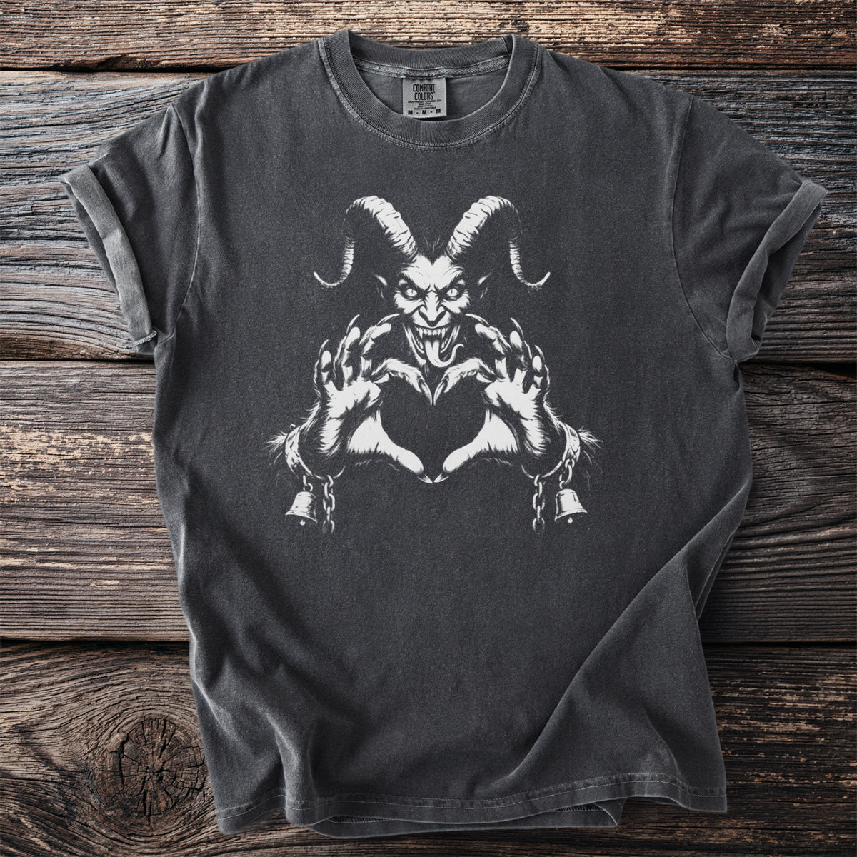 Dark t-shirt with a white graphic of a horned demon making a heart shape with its hands.