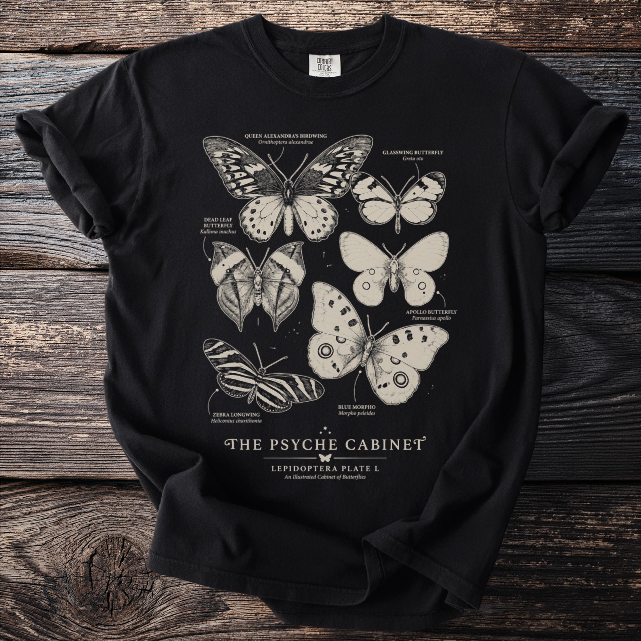 Black t-shirt with vintage butterfly illustrations labeled "The Psyche Cabinet".