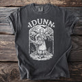 "Idunn" text above illustration of woman with apples and raven on t-shirt.