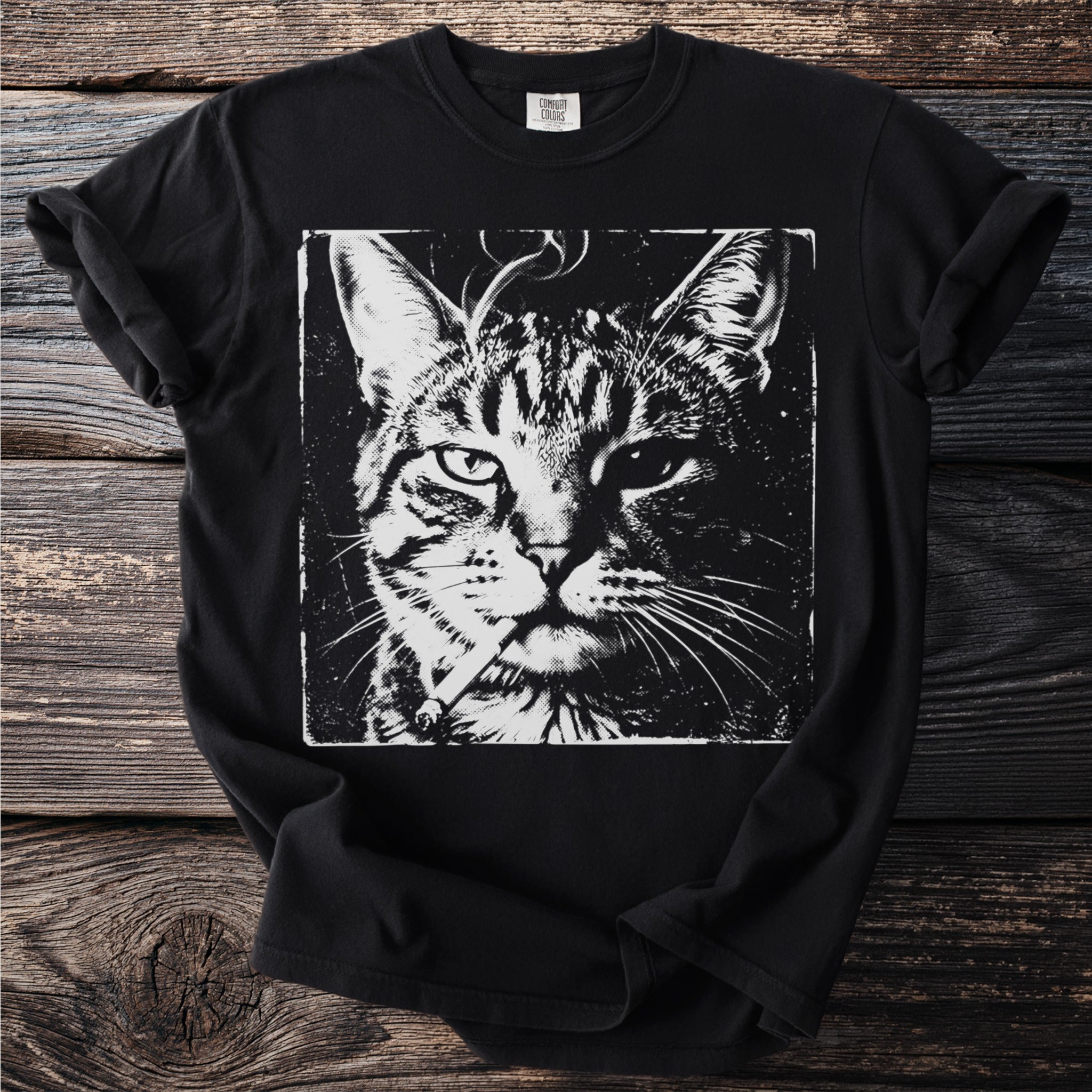 Black t-shirt with a distressed black and white graphic of a cat smoking a cigarette.