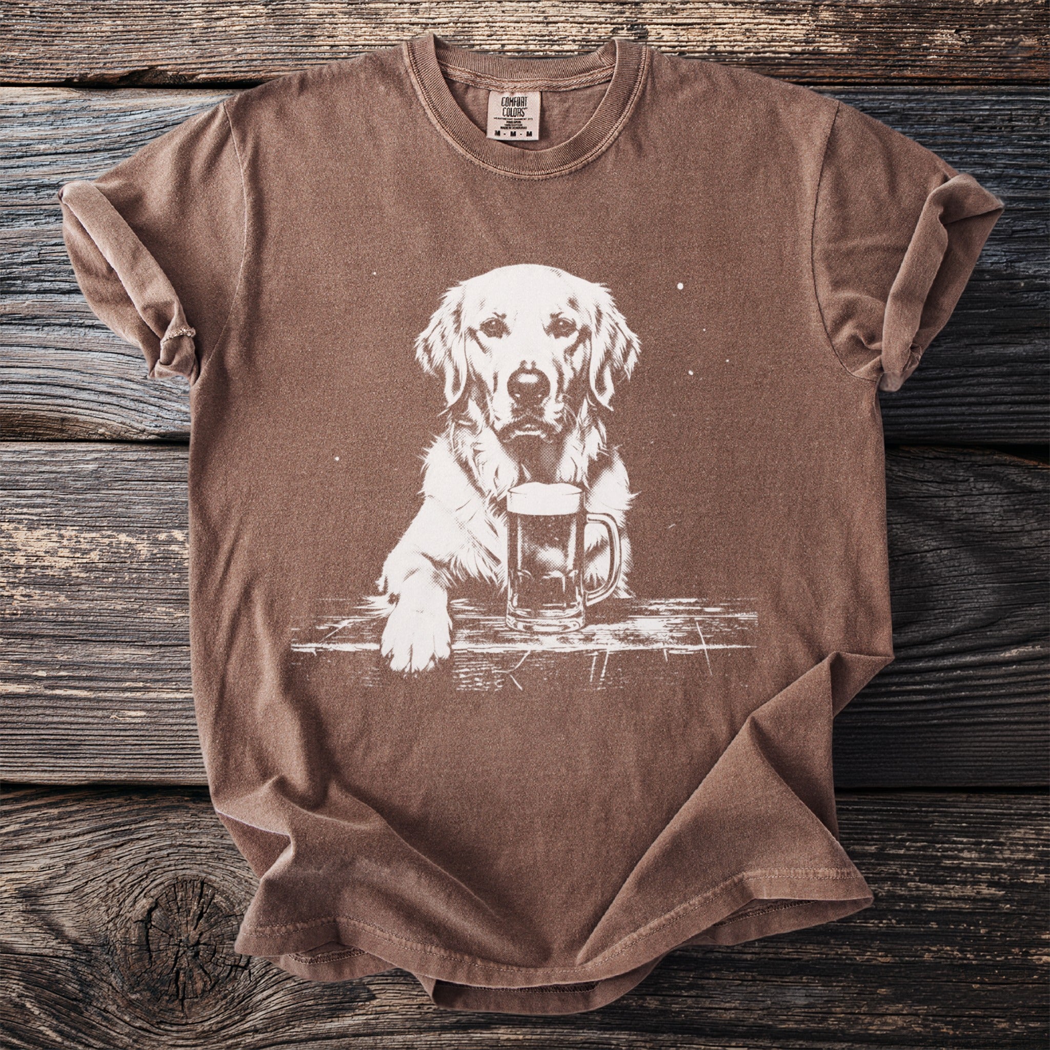 Brown t-shirt with white graphic of a golden retriever holding a beer mug.