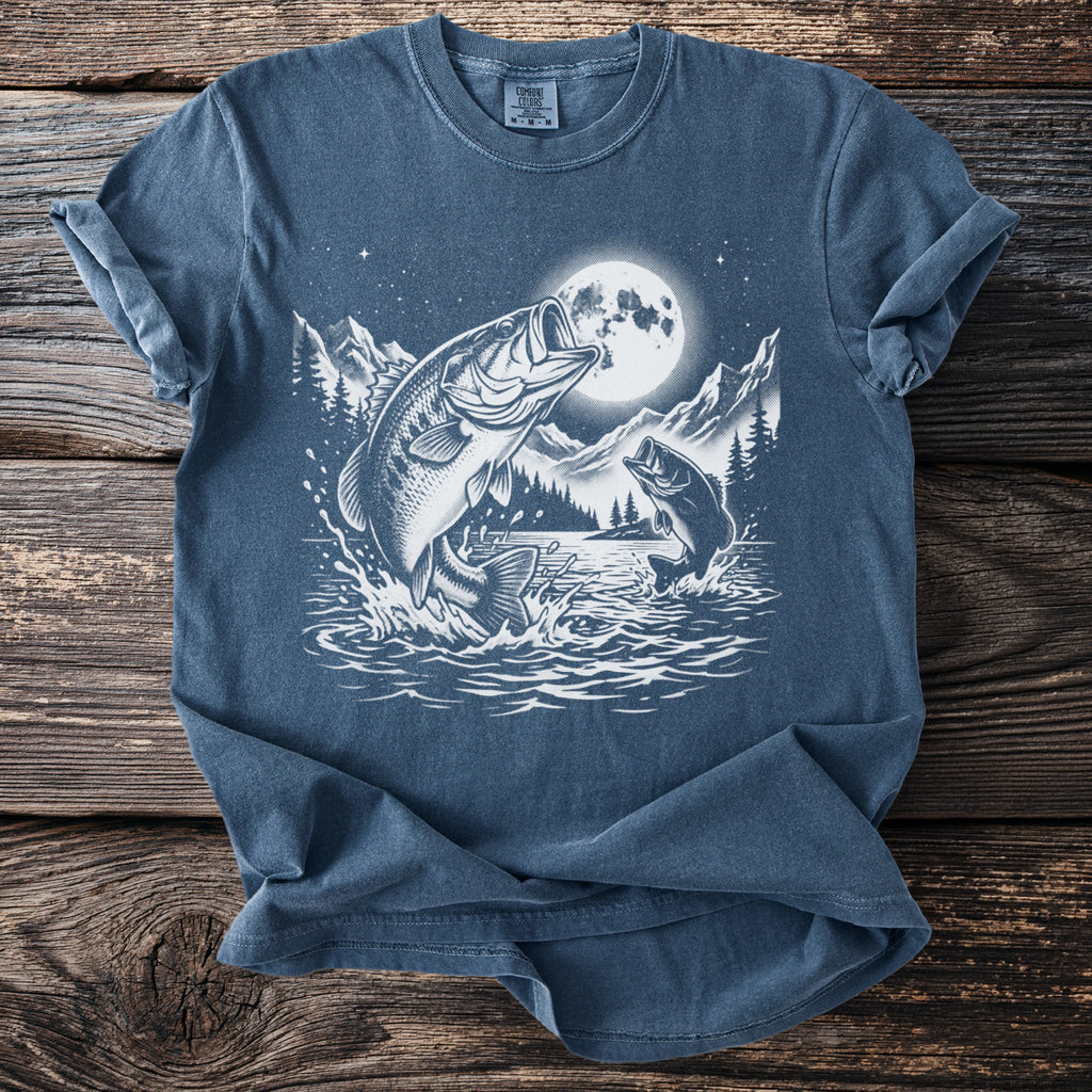 Blue t-shirt graphic of bass jumping out of water under a full moon.