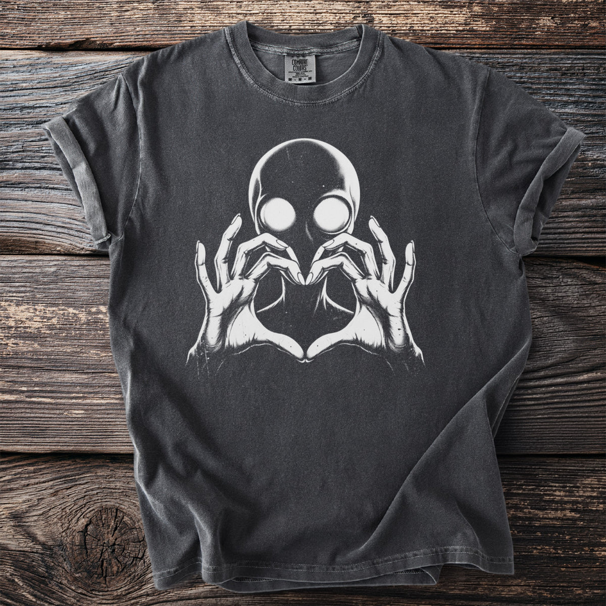 Charcoal t-shirt with graphic of alien head and hands forming a heart