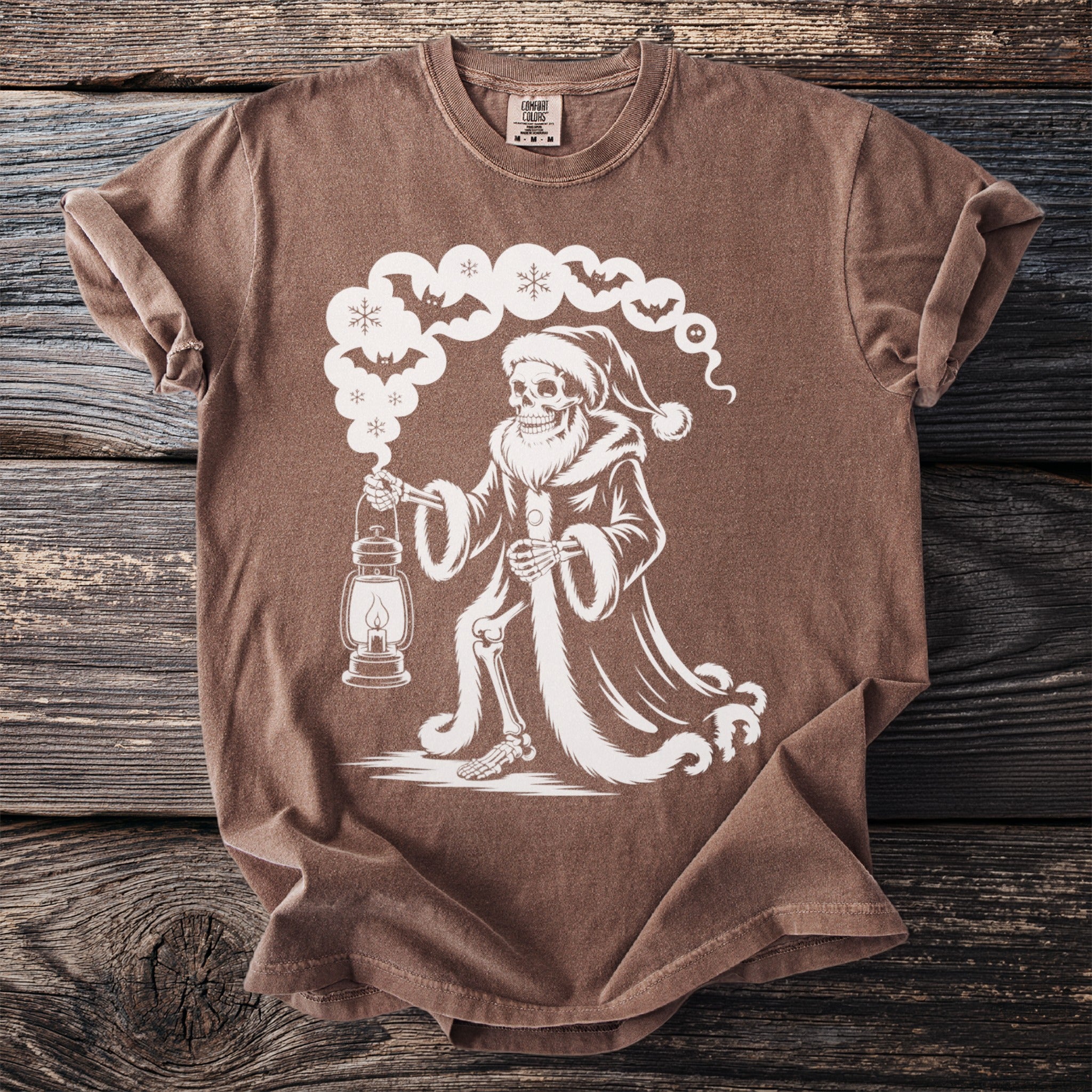 Skeleton in Santa hat holding lantern with bats and snowflakes.