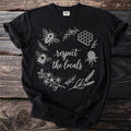 Black t-shirt with white floral and bee graphic that reads "respect the locals."