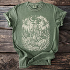 Green t-shirt with a cream graphic of a wizard, two wolves, two ravens, and runes.