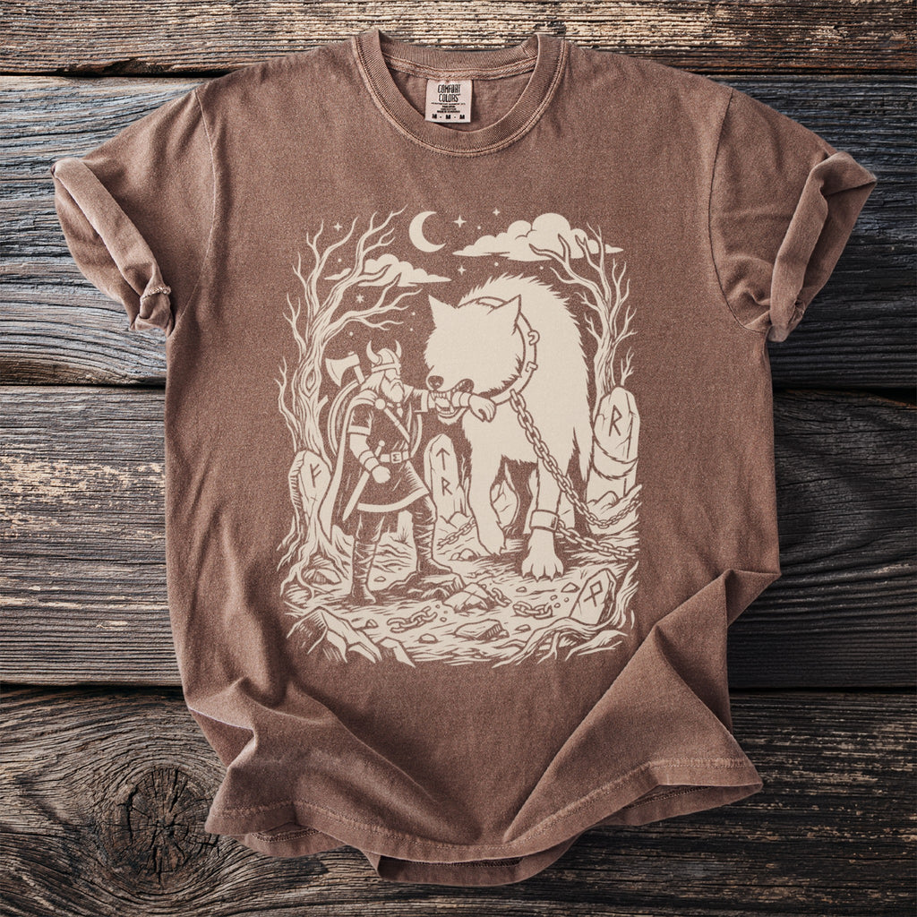 Viking warrior and chained wolf graphic on a brown t-shirt with a moon and stars.
