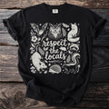 Black t-shirt with white line art of woodland animals and text "respect the locals".
