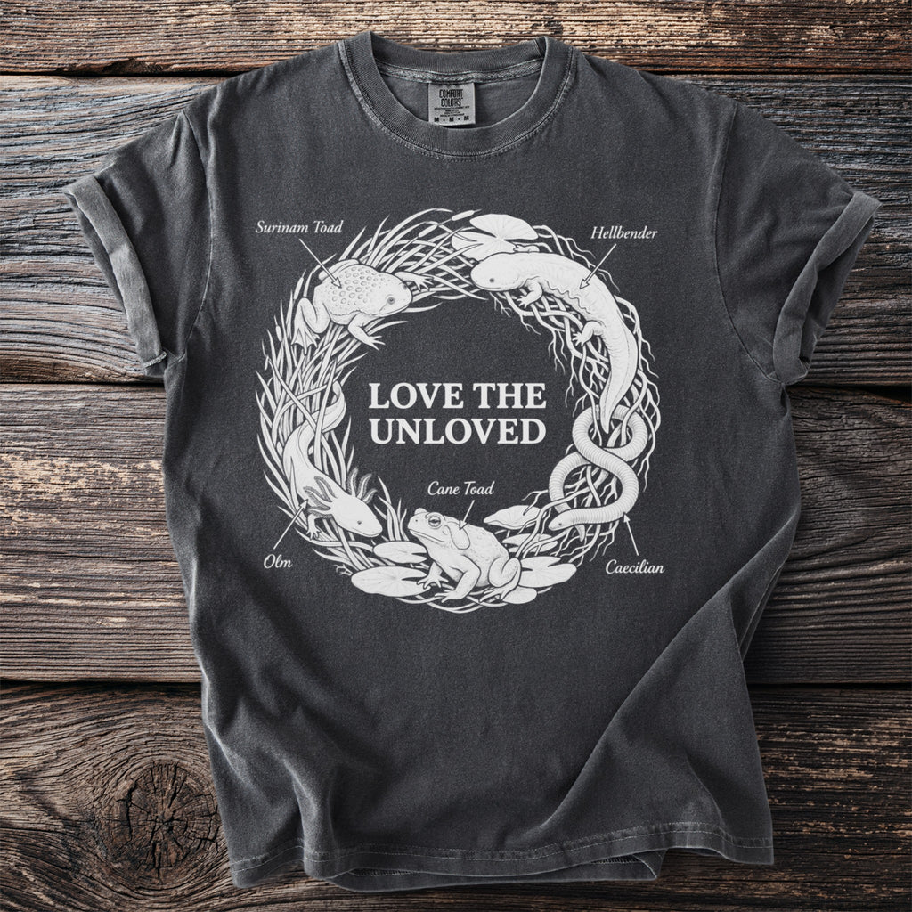 Dark grey t-shirt with white line art of amphibians and reptiles arranged in a circle with text.