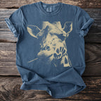 Blue t-shirt with a tan graphic of a giraffe's head eating a leaf.