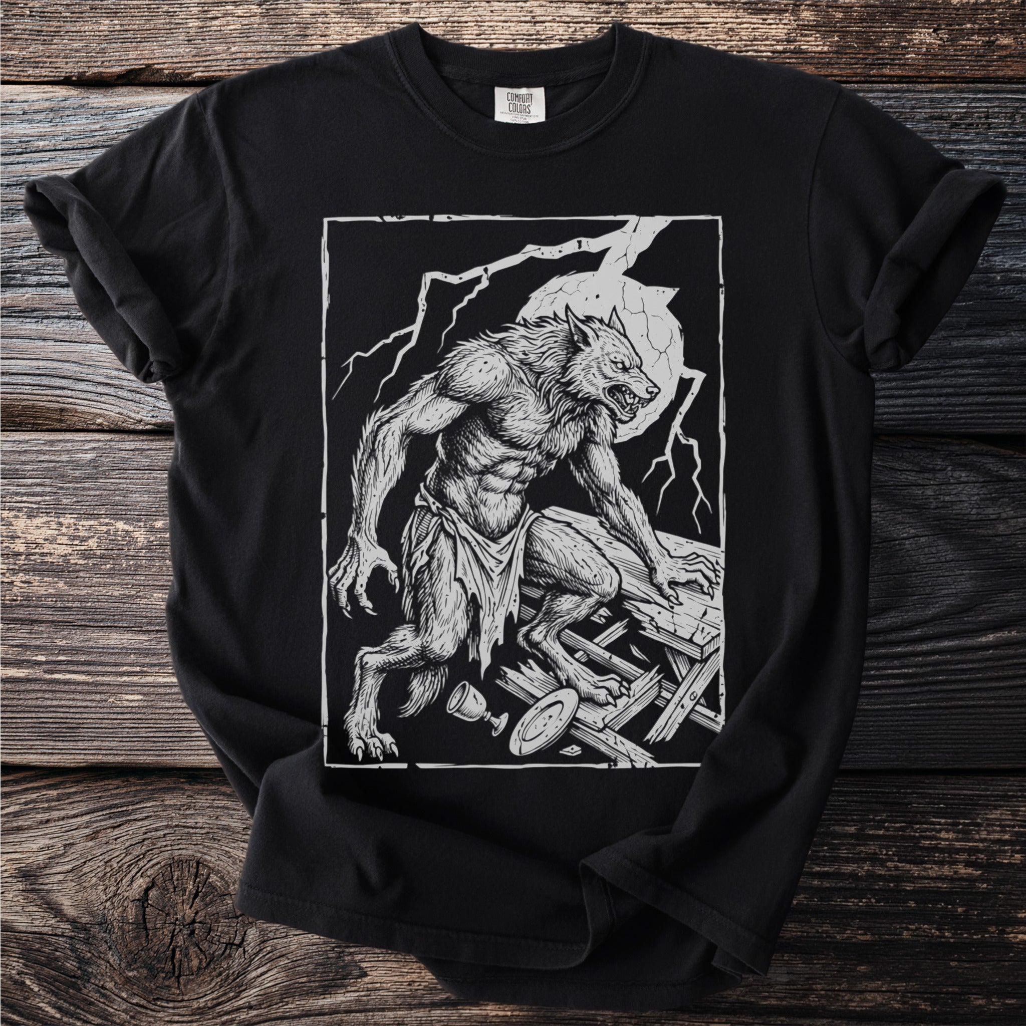 Werewolf illustration on a black t-shirt with a distressed wood background.