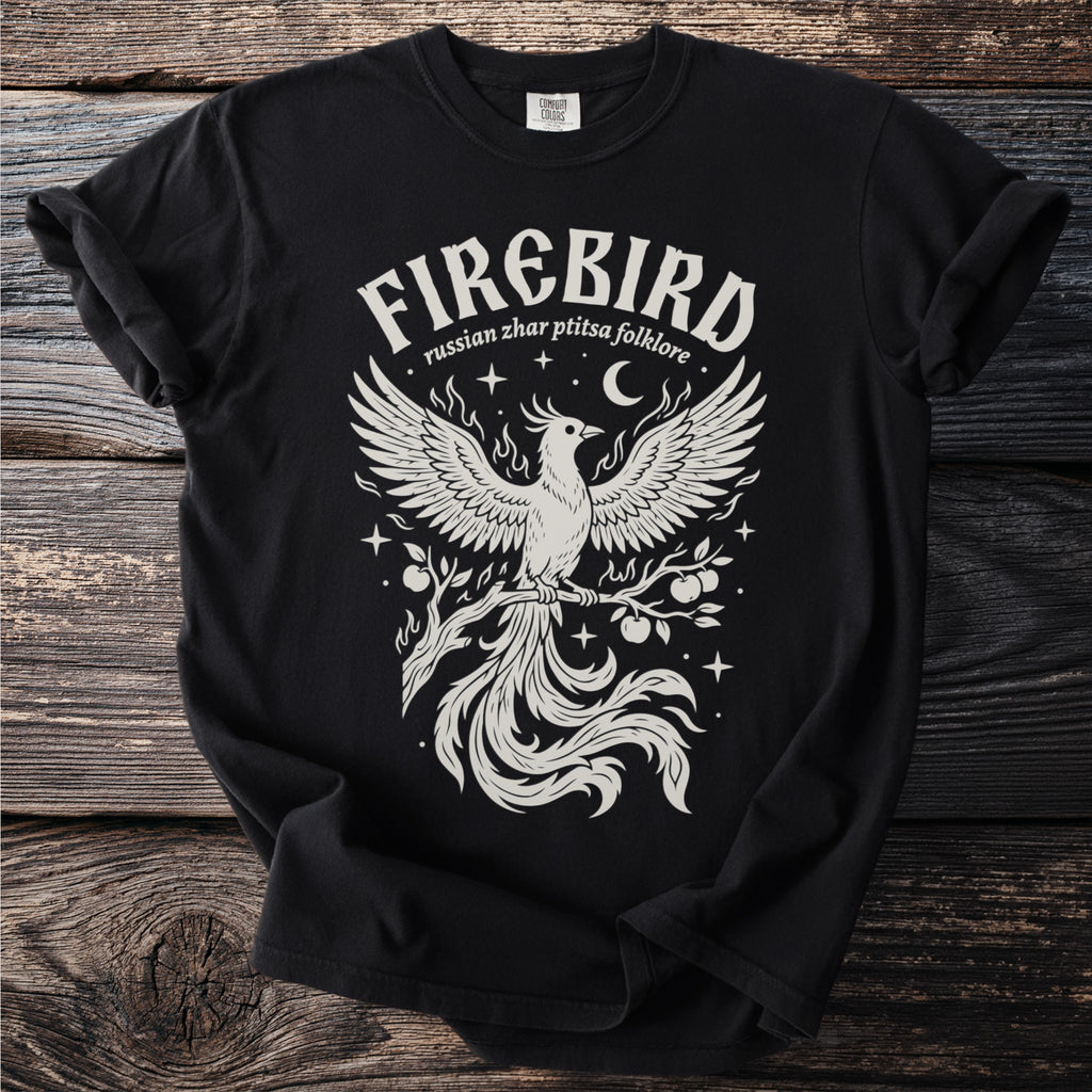 Black t-shirt with a white Firebird design and "russian zhar ptitsa folklore" text.