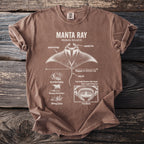 Brown t-shirt with a diagram of a manta ray's anatomy and labeled details.