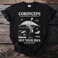 Black t-shirt with "Cordyceps we make the decisions so you don't have to." graphic.