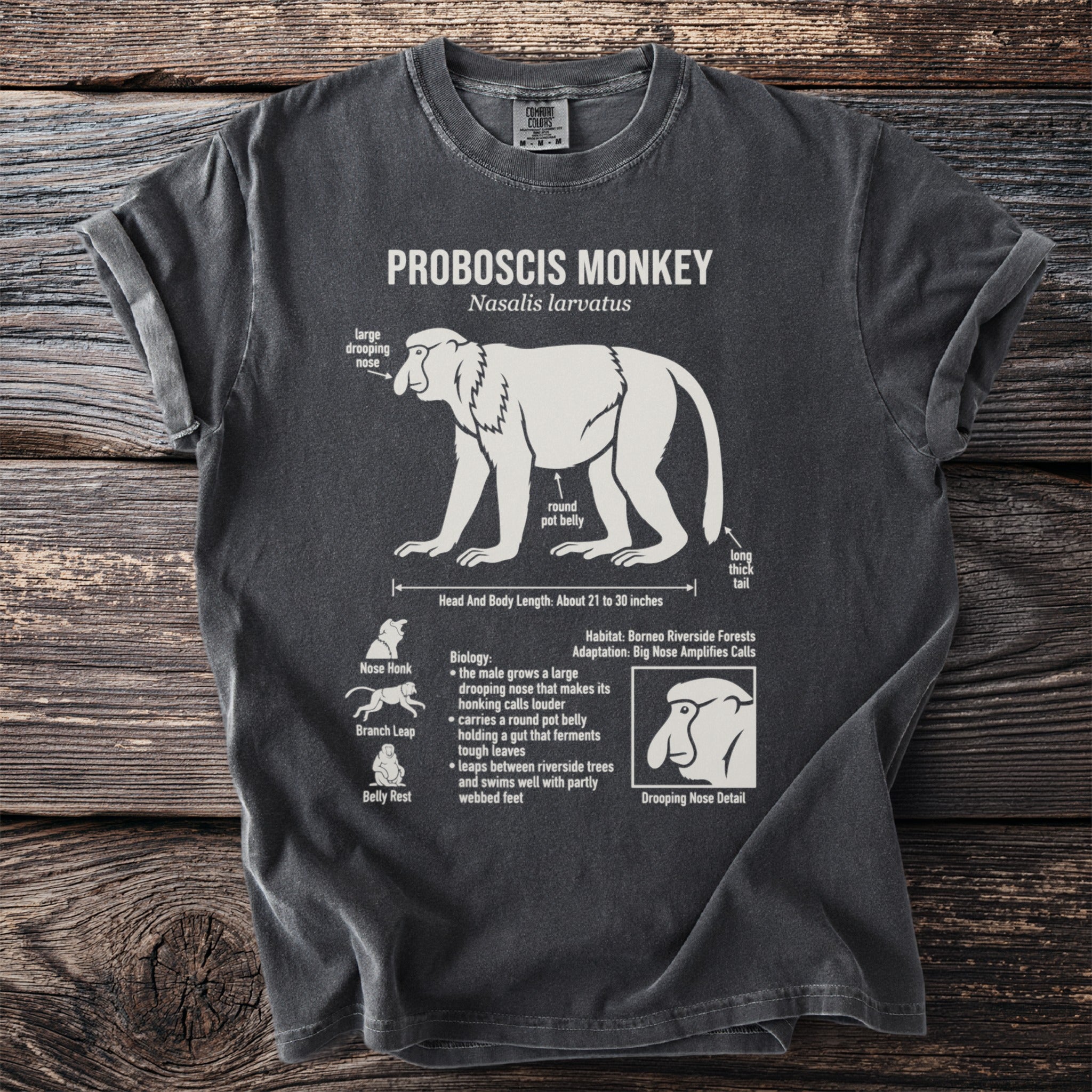 Proboscis Monkey diagram on a charcoal t-shirt with biology details.