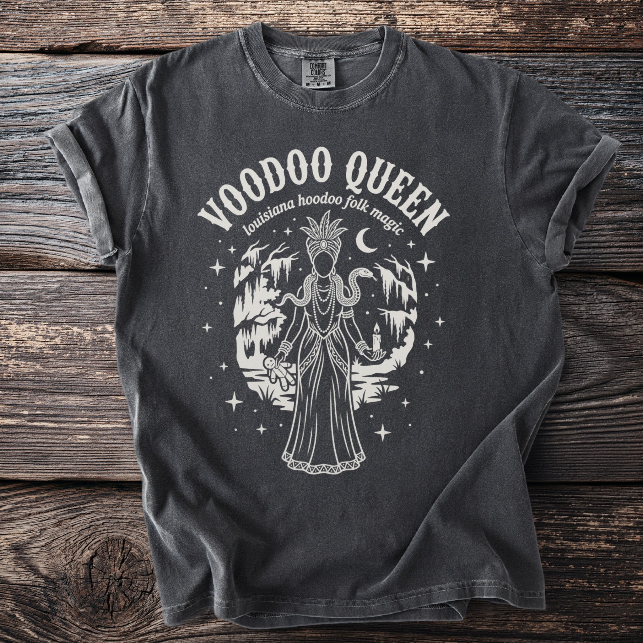 Black t-shirt with Voodoo Queen graphic and gothic undertones.