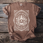 Brown t-shirt with white distressed print of a bottle, skull, and botanical elements.